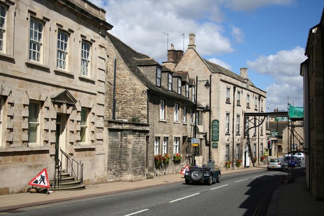 The George at Stamford coaching inn with its gallows sign across St Martin's